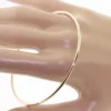 14K Solid Gold 2 mm Round Wire 7 to 9.5 grams Stacking Bangle Bracelet2